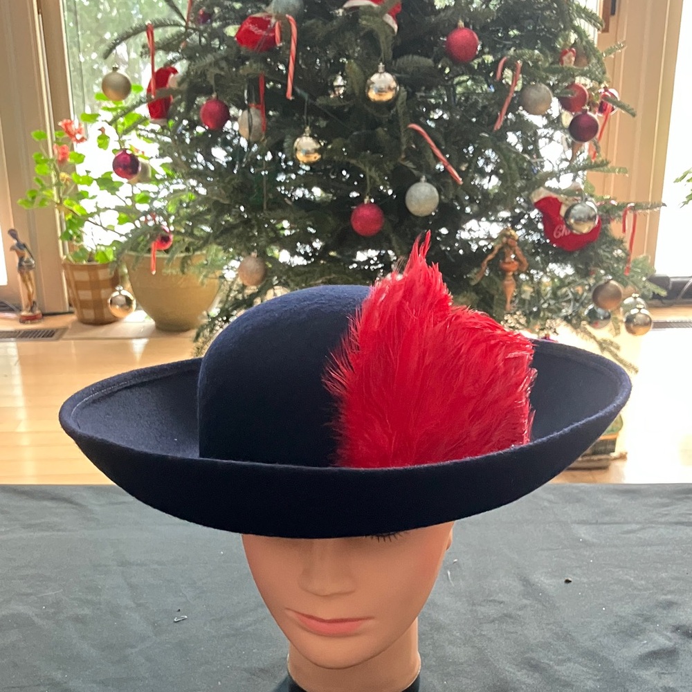 Chic Navy Blue Wool Hat with Vibrant Red Feather